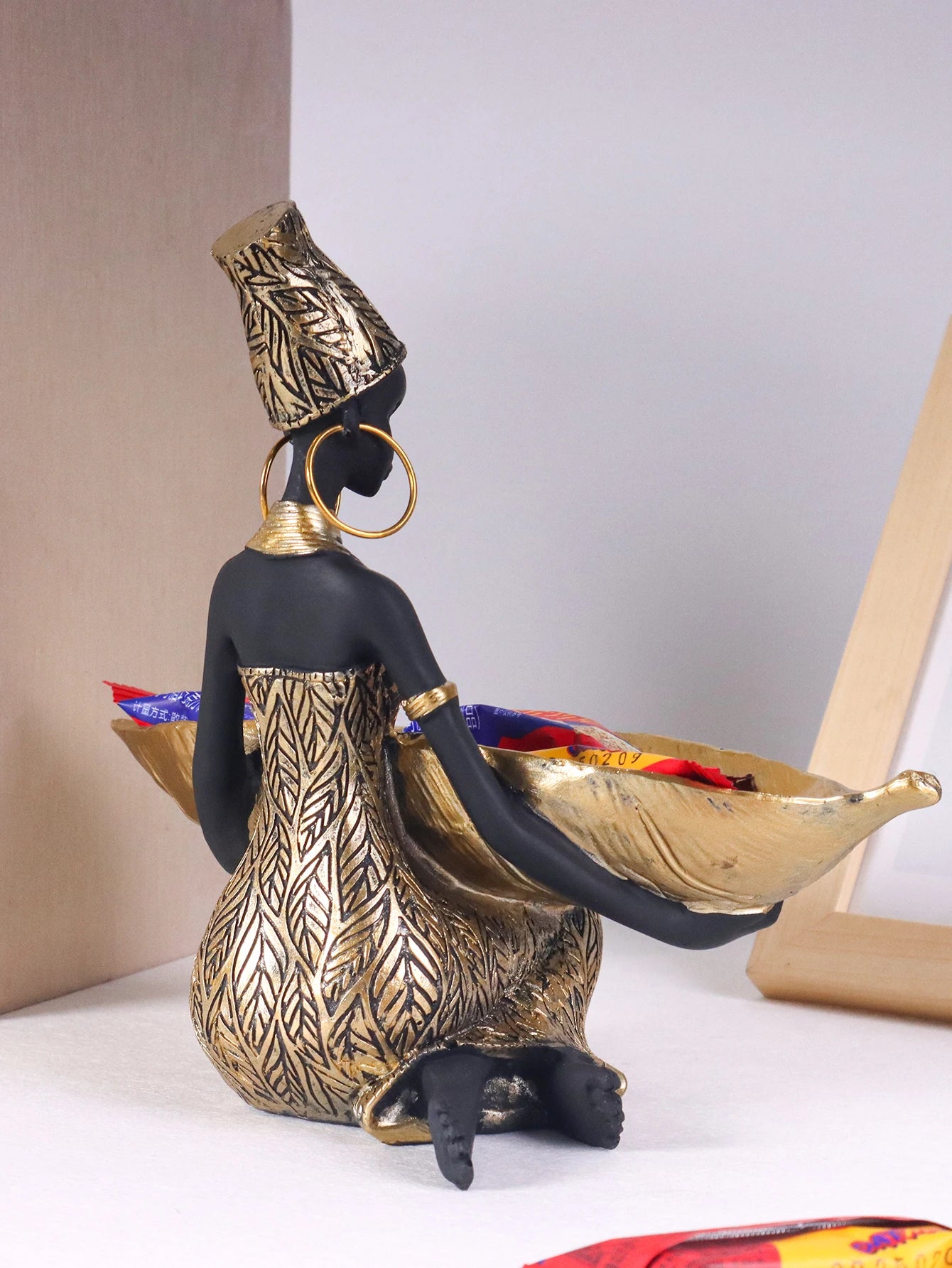 African Girl Holding a Plate Sculpture